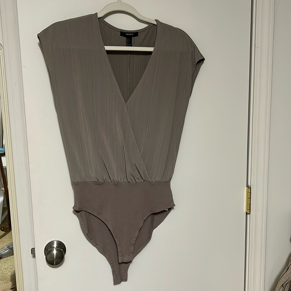 Gray bodysuit with button snap closure. Size small